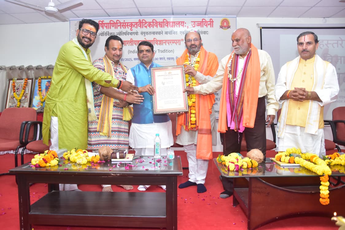 Astrologer Dr.Laxmikant Tripathi felicitation with Swasti Patra